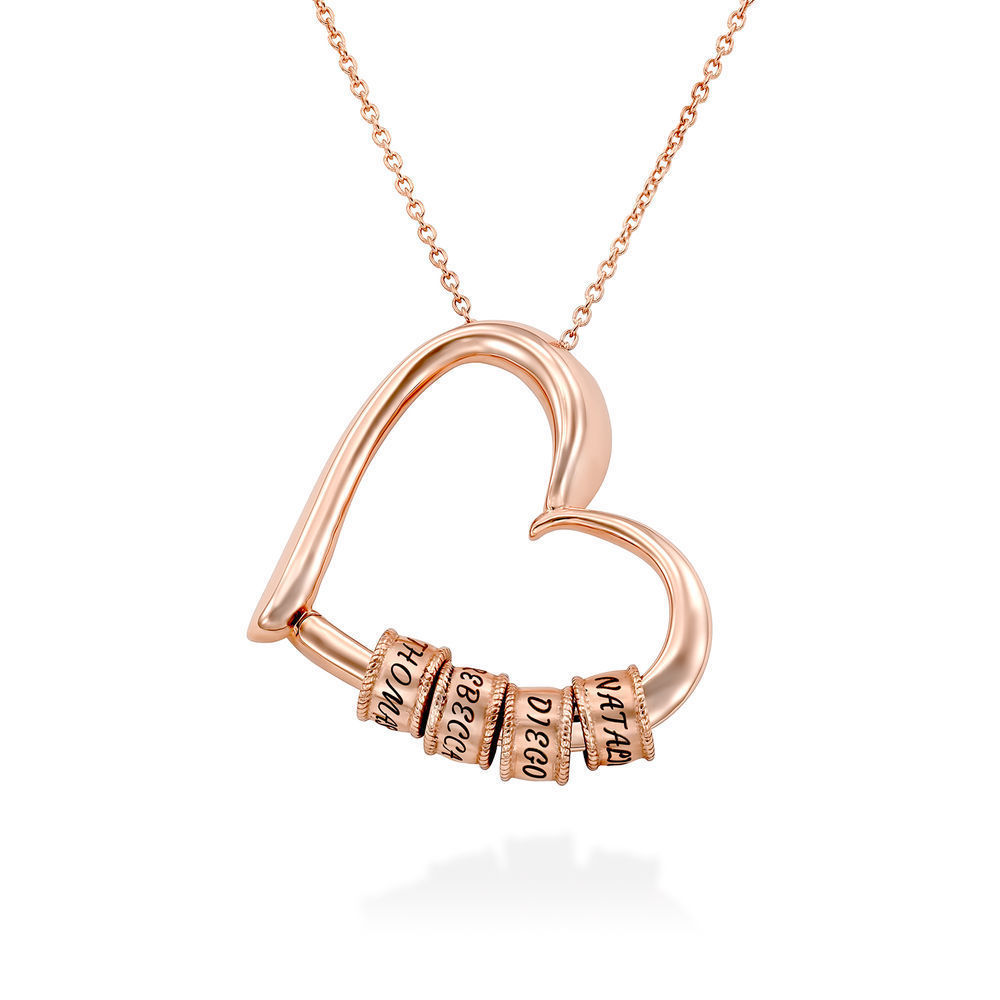 Rose gold personalized heart necklace with engraved beads on white background