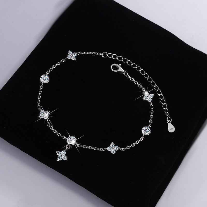 Sterling silver zodiac bracelet with diamond-cut moissanite centerpiece
