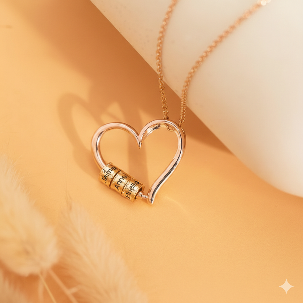 Rose gold personalized name necklace with engraved beads on soft background