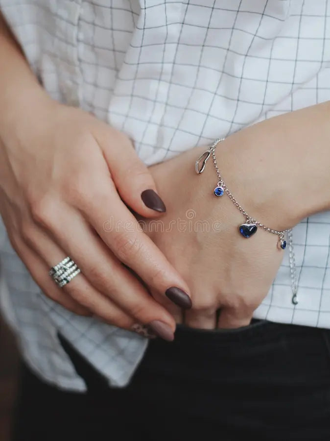 charm bracelets for women in gold and silver with small charms