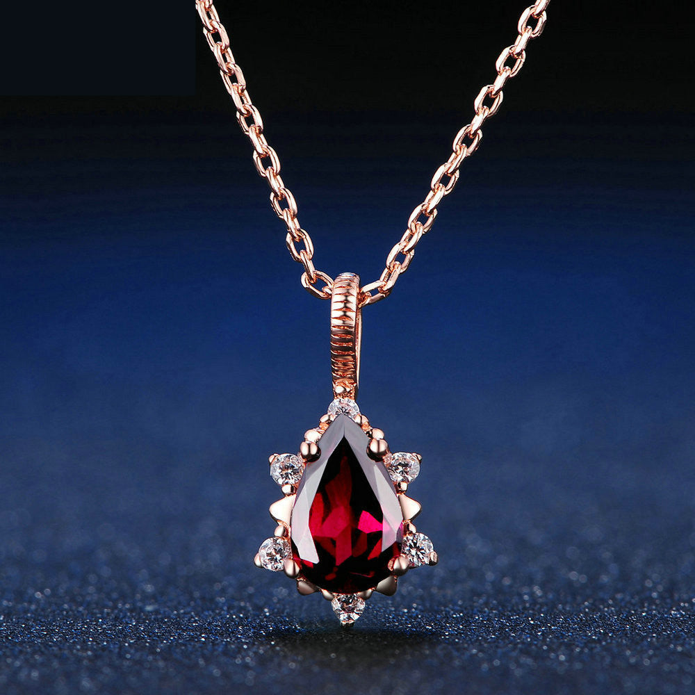 Single garnet pendant in 925 sterling silver, showcasing rich red gemstone and drop shape design