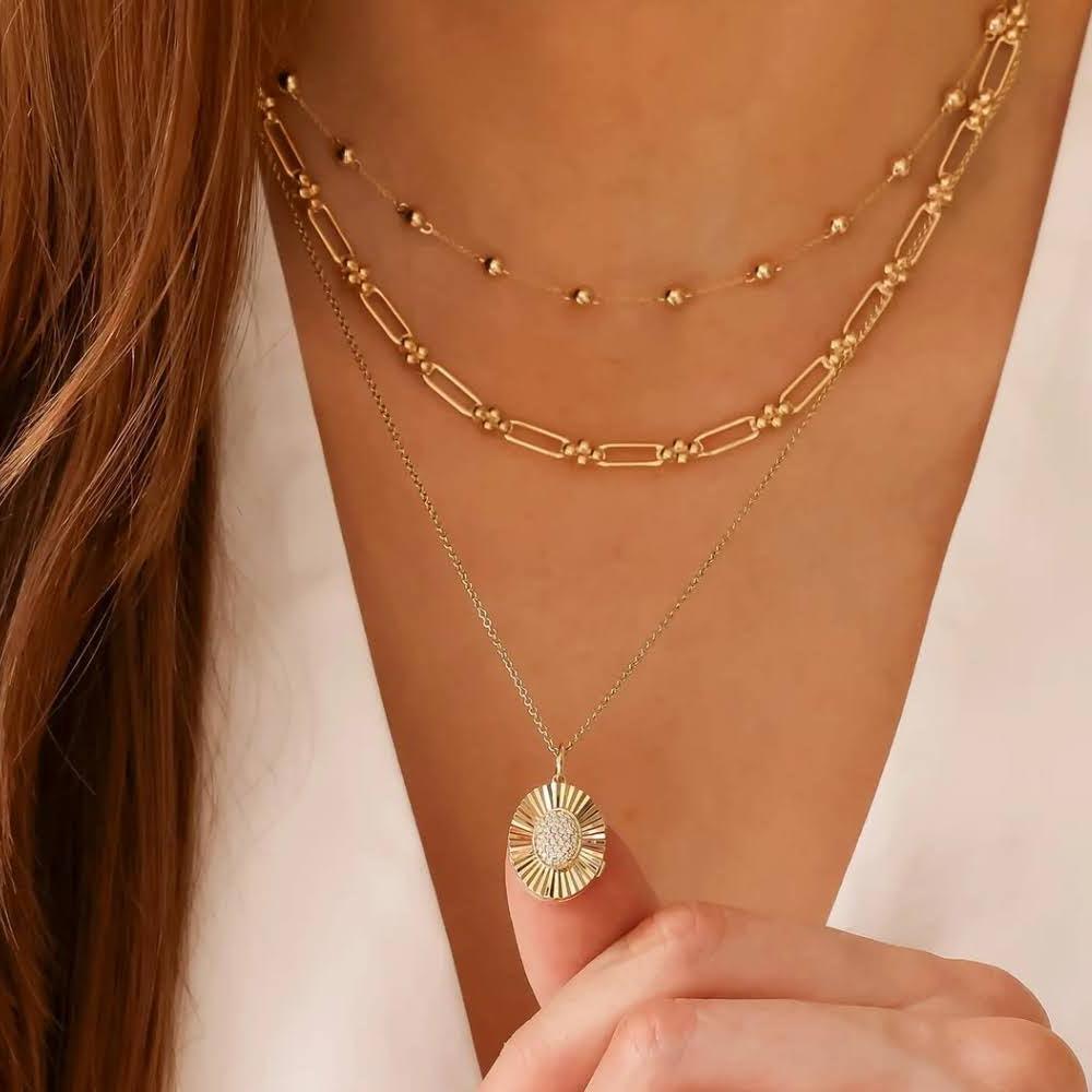 different necklace styles for women including layered dainty and pendant necklaces