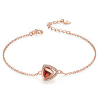 Garnet geometric silver bracelet close-up on white background