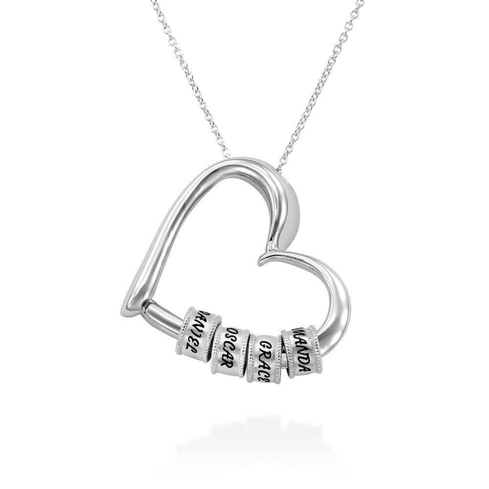 Silver custom name necklace with engraved heart beads on white background