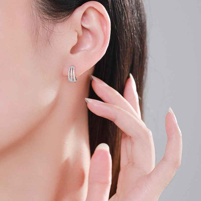 Sterling silver earrings with polished finish and classic design