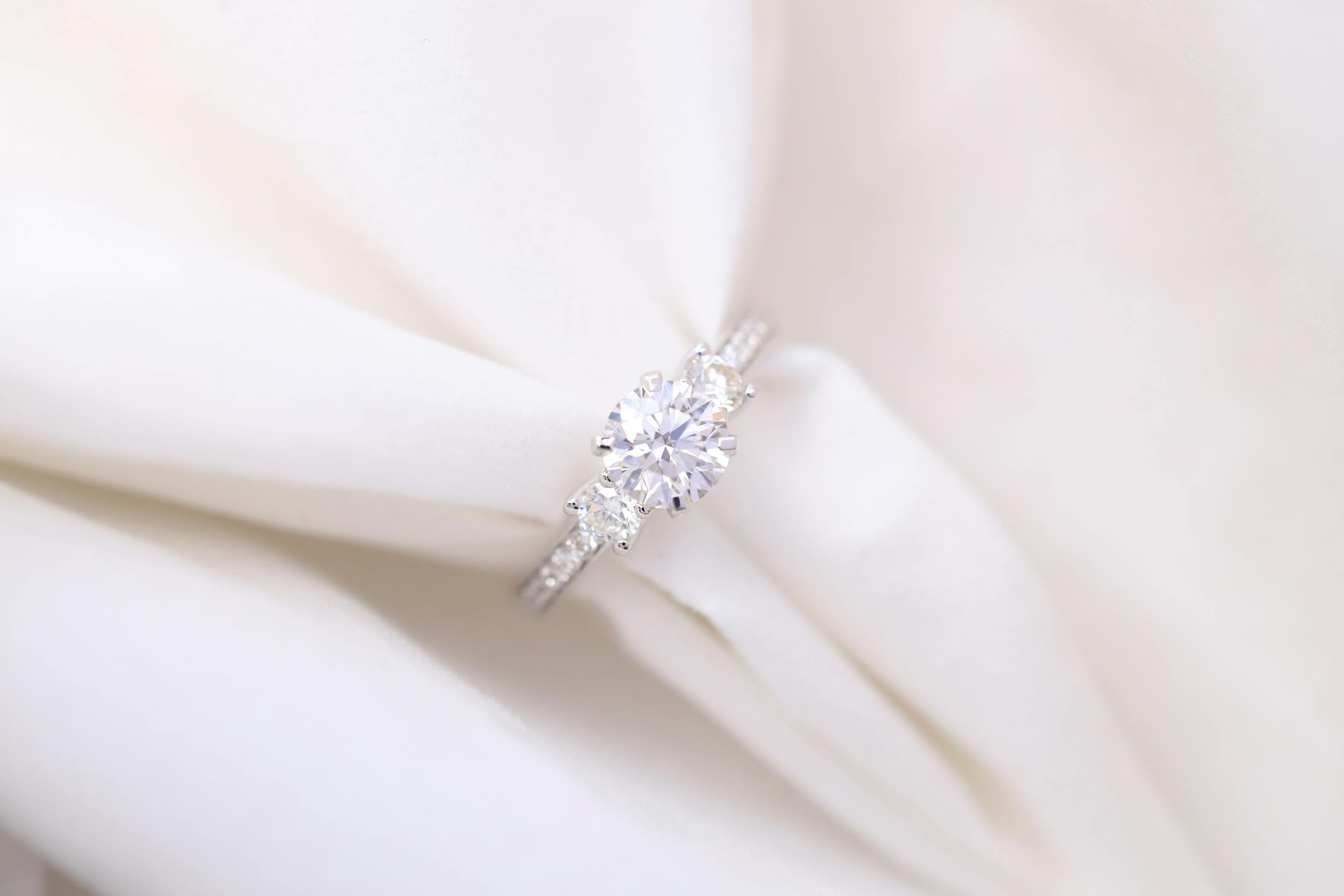 Elegant silver jewelry for women on soft white background